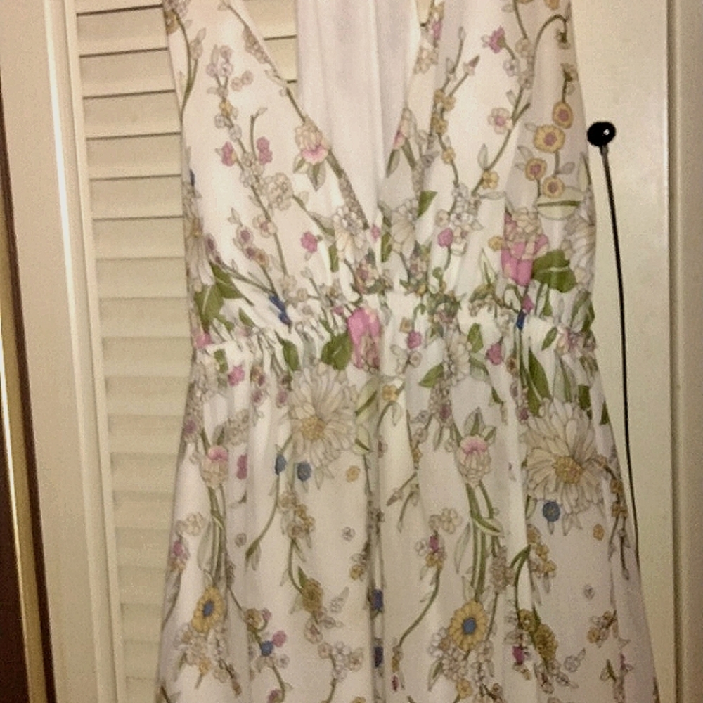Floral Floor length shoulder less printed sun dress.
